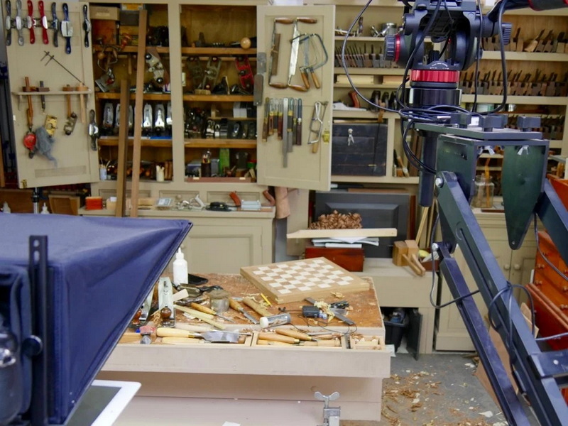 a chess board with hand tools