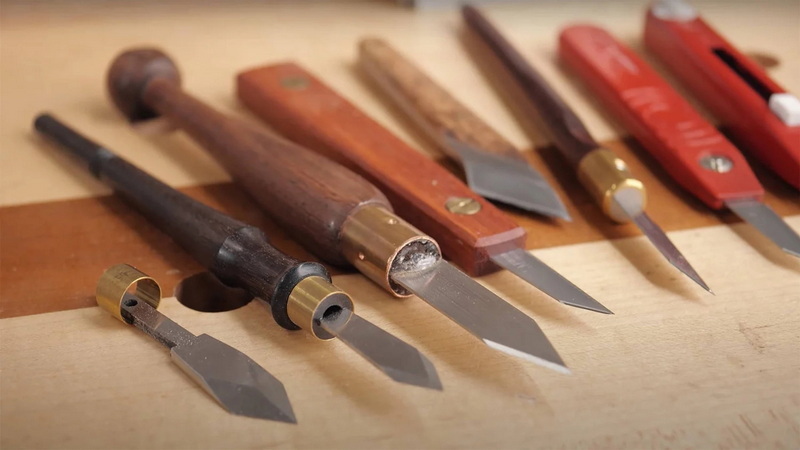 a knife with hand tools