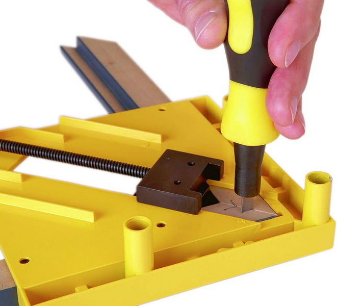 a picture frame with hand tools